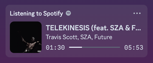 Spotify 'Now Playing' widget showing Telekinesis by Travis Scott